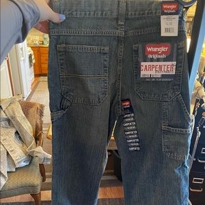 Brand new with tags wrangler jeans.Size 14 boys,regular length!